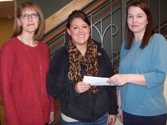 The Zonta Club of Pierre-Fort Pierre awarded Toni Vetter a scholarship for the Fall 2012 semester. Toni is a first-year nursing student attending Capital University Center in Pierre. Pictured are Denise Luckhurst, Zonta Club President, Toni Vetter and Kari Stulken, Zonta Club Scholarship Chair. 